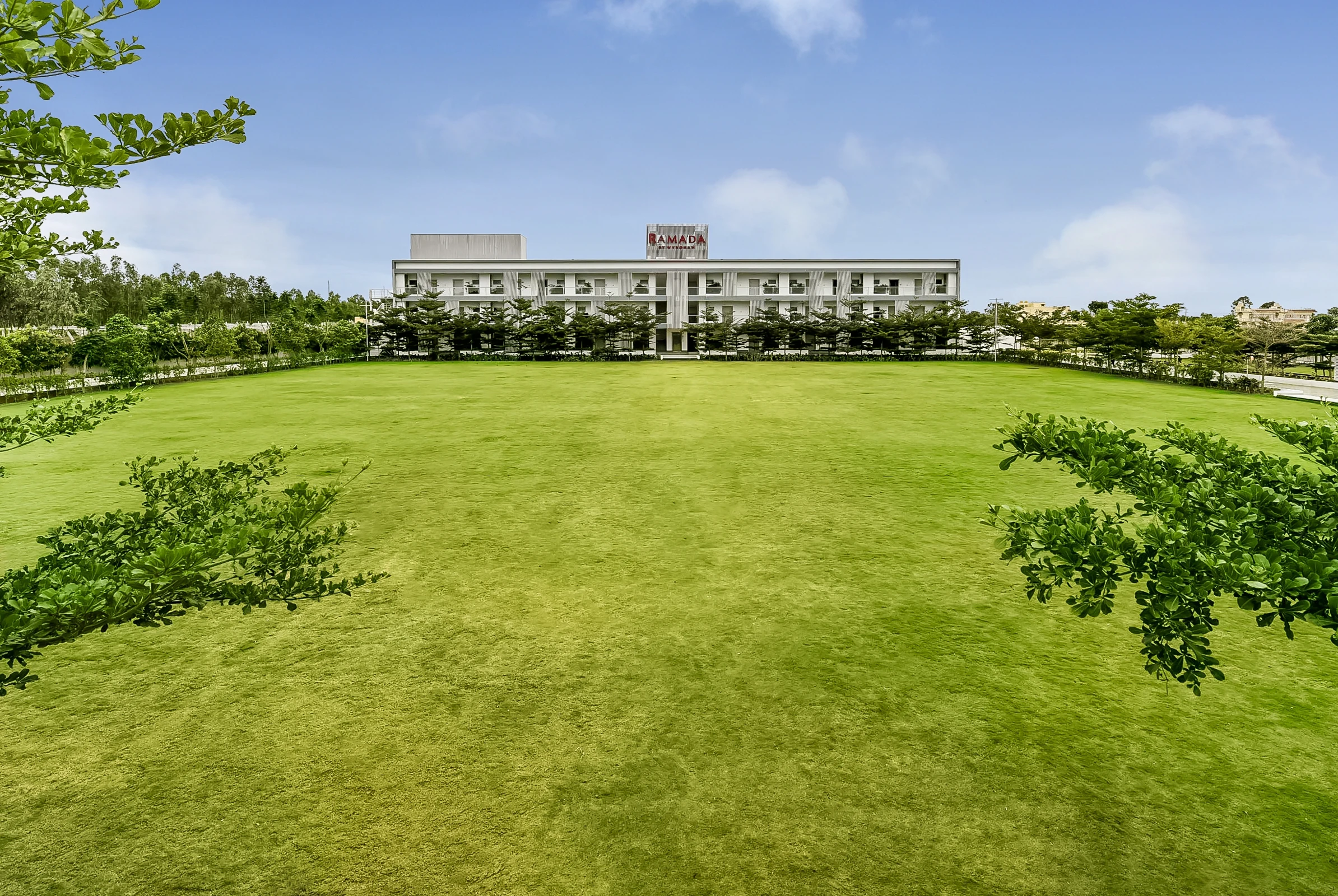 Ramada by Wyndham Bengaluru Yelahanka landscaped gardens and exterior