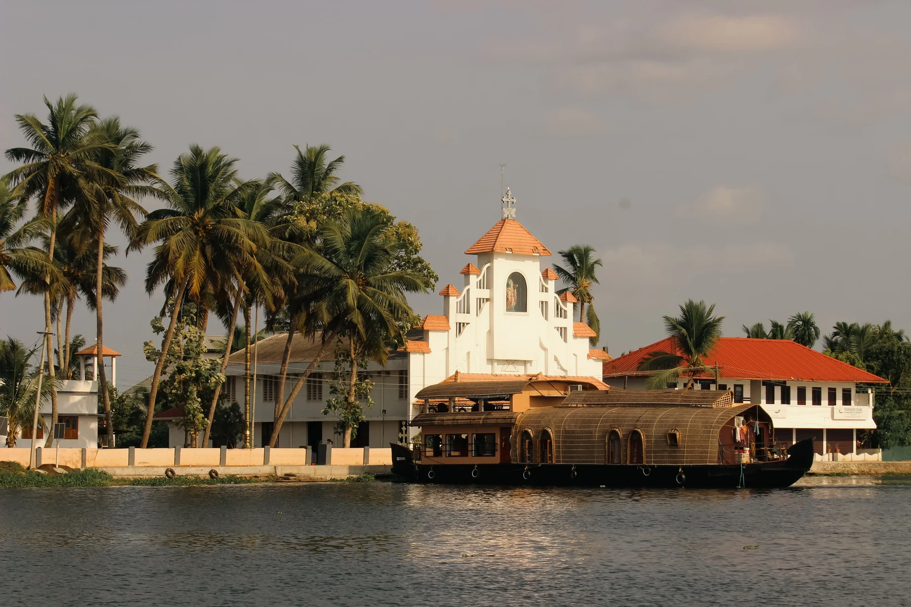 A houseboat on the palm-lined Alappuzha backwaters