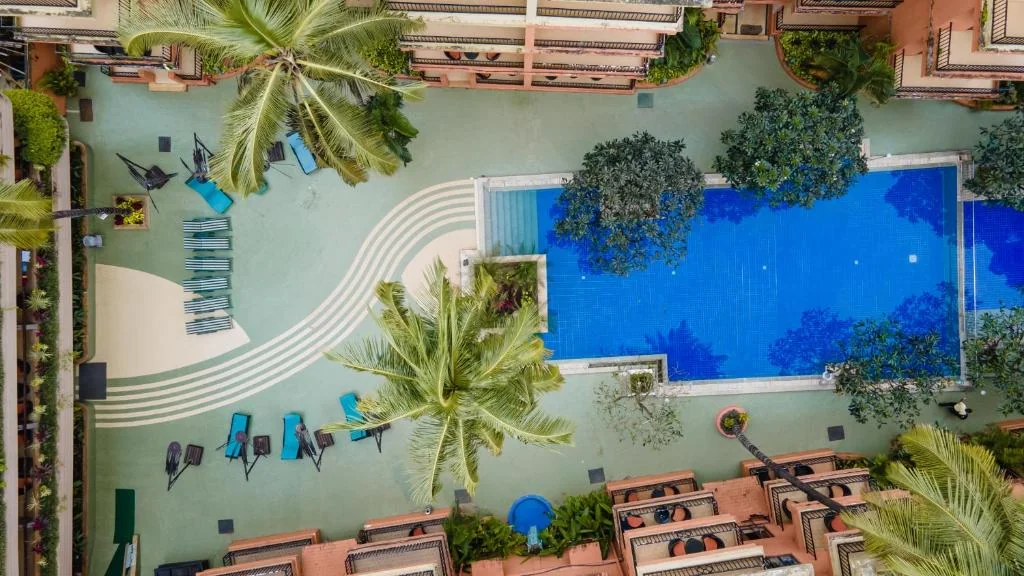 Elevated view of the central pool, courtyard and hotel wings.